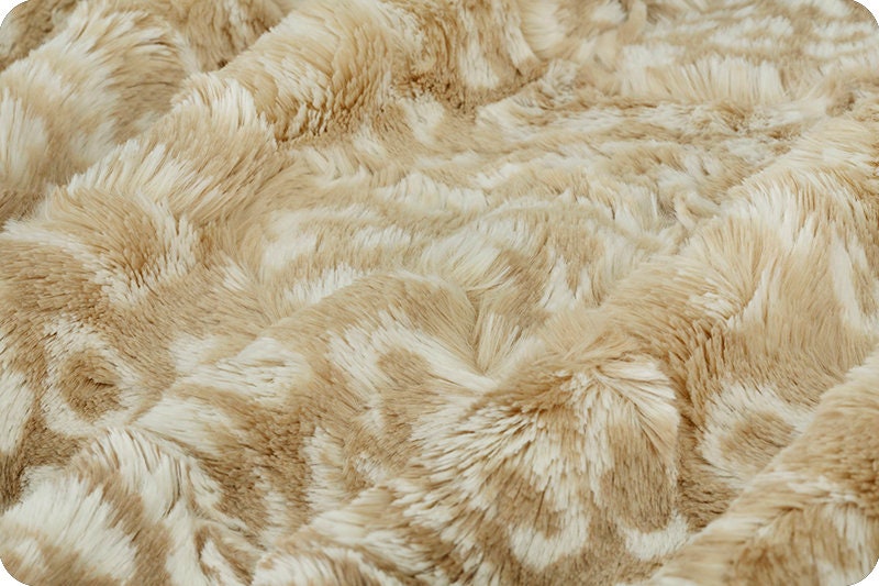 Ocelot Biscotti Throw Blanket